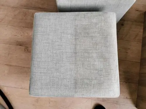 Sofa cushion half cleaned