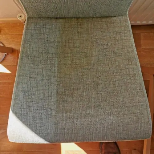 Dining chair showing half clean patch